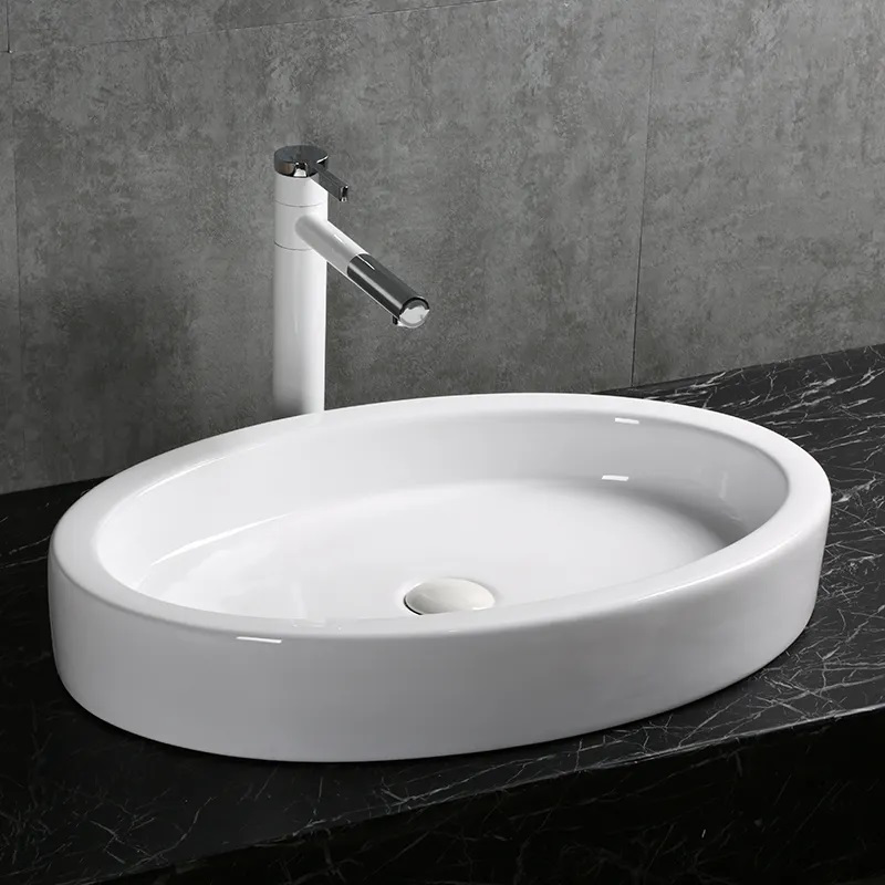 Раковина накладная Ceruttispa CR7045 (630х415х100) белая, овальная